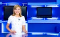 Television anchorwoman at TV studio Royalty Free Stock Photo