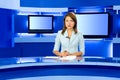 Television anchorwoman at TV studio