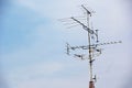 Television antenna with blue sky Royalty Free Stock Photo