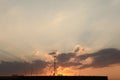 Television antennas on the roof pictured at sunset