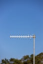 Television antennas with sky background. Analog television antenna on roof. Antennae for digital TV and radio reception. Mobile co
