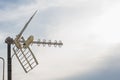 Television antennas with sky background. Analog television antenna on roof.