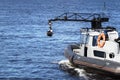 Television camera is mounted on the side of the motor boat. Live broadcast
