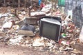 Television and electrical appliances on the road side garbage dustbin. Royalty Free Stock Photo