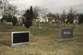 Television in graveyard. Royalty Free Stock Photo