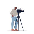 Television operator using video camera on tripod cameraman looking through camcorder movie making concept