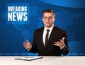 Television presenter in front telling breaking news with blue mo Royalty Free Stock Photo