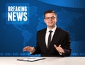 Television presenter in front telling breaking news with blue mo Royalty Free Stock Photo