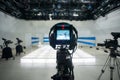 Television studio with camera and lights Royalty Free Stock Photo
