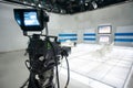 Television studio with camera and lights Royalty Free Stock Photo
