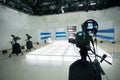 Television studio with camera and lights Royalty Free Stock Photo
