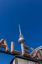 Television tower (Fernsehturm) and ALEX letters Royalty Free Stock Photo