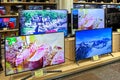 Televisions of different brands in the electronics store. Minsk, Belarus - june 29, 2020