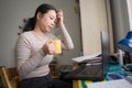 Telework and remote job - lifestyle portrait of young relaxed and beautiful Asian Chinese woman working on laptop at home office Royalty Free Stock Photo