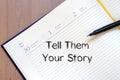 Tell them your story write on notebook