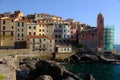 Village of Tellaro di Lerici near the Cinque Terre. View of the village illuminated by the light of the sunset. Houses, church Royalty Free Stock Photo