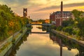 The Teltow Canal in Berlin-Tempelhof, Germany, overlooking bridges and old factory buildings in the light of the sun Royalty Free Stock Photo