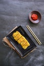 Telur dadar gulung or Tamagoyaki or Japaneses egg roll. Gyeran Mari or Korean Rolled Omelette. fried egg. Royalty Free Stock Photo