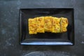 Telur dadar gulung or Tamagoyaki or Japaneses egg roll. Gyeran Mari or Korean Rolled Omelette. fried egg. Royalty Free Stock Photo