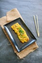 Telur dadar gulung or Tamagoyaki or Japaneses egg roll. Gyeran Mari or Korean Rolled Omelette. fried egg. Royalty Free Stock Photo