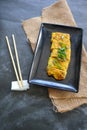 Telur dadar gulung or Tamagoyaki or Japaneses egg roll. Gyeran Mari or Korean Rolled Omelette. fried egg. Royalty Free Stock Photo