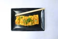 Telur dadar gulung or Tamagoyaki or Japaneses egg roll. Gyeran Mari or Korean Rolled Omelette. fried egg isolate white background. Royalty Free Stock Photo