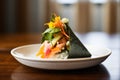 temaki handroll with spillingout seafood and veggies Royalty Free Stock Photo