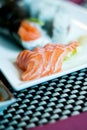 Temaki sushi, sushi, salmon and wasabi on a plate Royalty Free Stock Photo