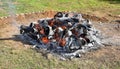 Temazcal bonfire with red hot sacred stones inside. Royalty Free Stock Photo