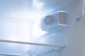 Temperature regulator inside the refrigerator and lamp for lighting inside when opening the door Royalty Free Stock Photo