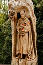 Templar knight monument carved in the wood of a tree trunk