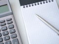 Template with caculator pen notepad on white table top view background. Royalty Free Stock Photo