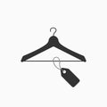 Template clothes hanger with blank paper label. Hanger icon with tag flat icon. Sale label for store or marketplace. Vector