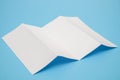 Template fold white paper on blue background Royalty Free Stock Photo
