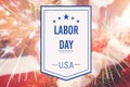 Template of Labor Day. White sign on double exposure background with waving flag of the USA. Concept of patriotism and Royalty Free Stock Photo