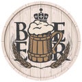 Beer label on wooden cask with full beer mug