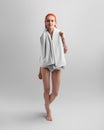 Template of a white bath towel on the shoulders of a naked red-haired girl, full-length, front