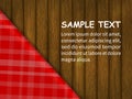 Template for your design. red checkered tablecloth on a wooden table, an example of the text.