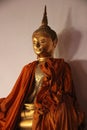 Gold Buddha With Smiling Face And Shadow