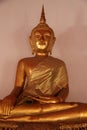 One Gold Buddhas With Mercifulness Face Seat On Stucco Base Royalty Free Stock Photo