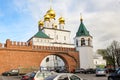 The temple with golden domes behind the fortress wall