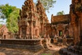 Temple Banteay Srei, Cambodia. Ruins of Hindu Temple Banteay Srei near Angkor Wat. Monkey guards in front of temple entrance