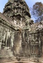 The temple with a bas-relief of a dinosaur on a column in the center of the photo.Siem Reap, Cambodia