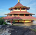 Temple building on the mountain next to the sea