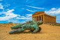 Temple of Concordia and the statue of Fallen Icarus, in the Valley of the Temples, Agrigento, Sicily, Italy