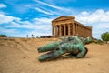 Temple of Concordia and the statue of Fallen Icarus, in the Valley of the Temples, Agrigento, Sicily, Italy