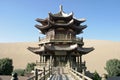 Temple in Crescent lake, Mingsha Shan Royalty Free Stock Photo