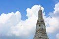 The Temple of Dawn or Wat Arun Buddhist temple with a beautiful blue sky and clouds background, copy space Royalty Free Stock Photo