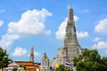 The Temple of Dawn or Wat Arun Buddhist temple with a beautiful blue sky and clouds background Royalty Free Stock Photo