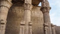 Temple of Edfu or Horus detail hieroglyphics with remaining color at entrance column area Royalty Free Stock Photo